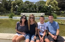 Family in front of Beverly Hills Sign