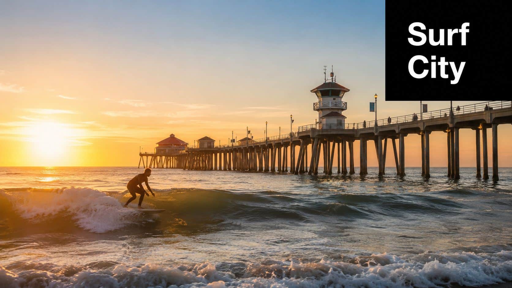 A silhouette of a surfer riding a wave near the Huntington Beach Pier during a beautiful golden sunset.