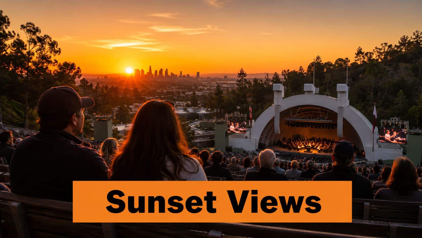 An audience watches a live concert at the Hollywood Bowl during a vibrant Los Angeles sunset.