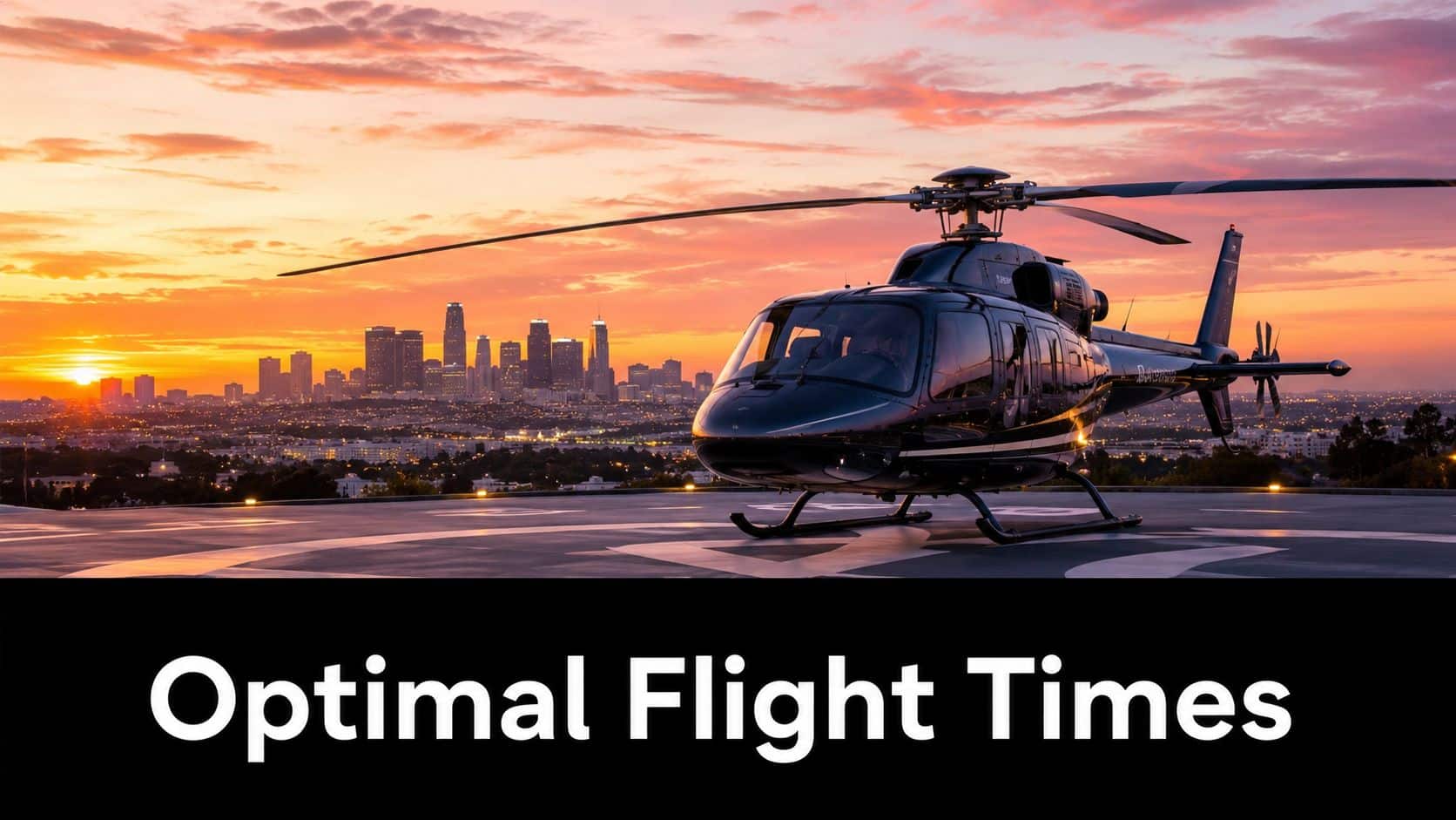 A black helicopter parked on a helipad overlooking a city skyline at sunset with orange clouds.