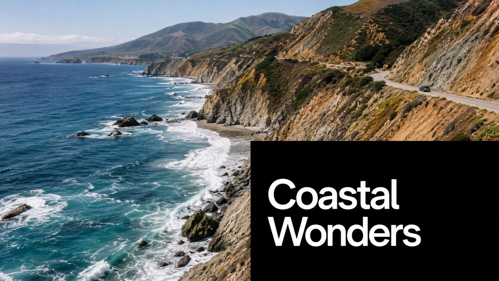 A scenic view of the winding Pacific Coast Highway along rugged California cliffs overlooking the blue ocean.