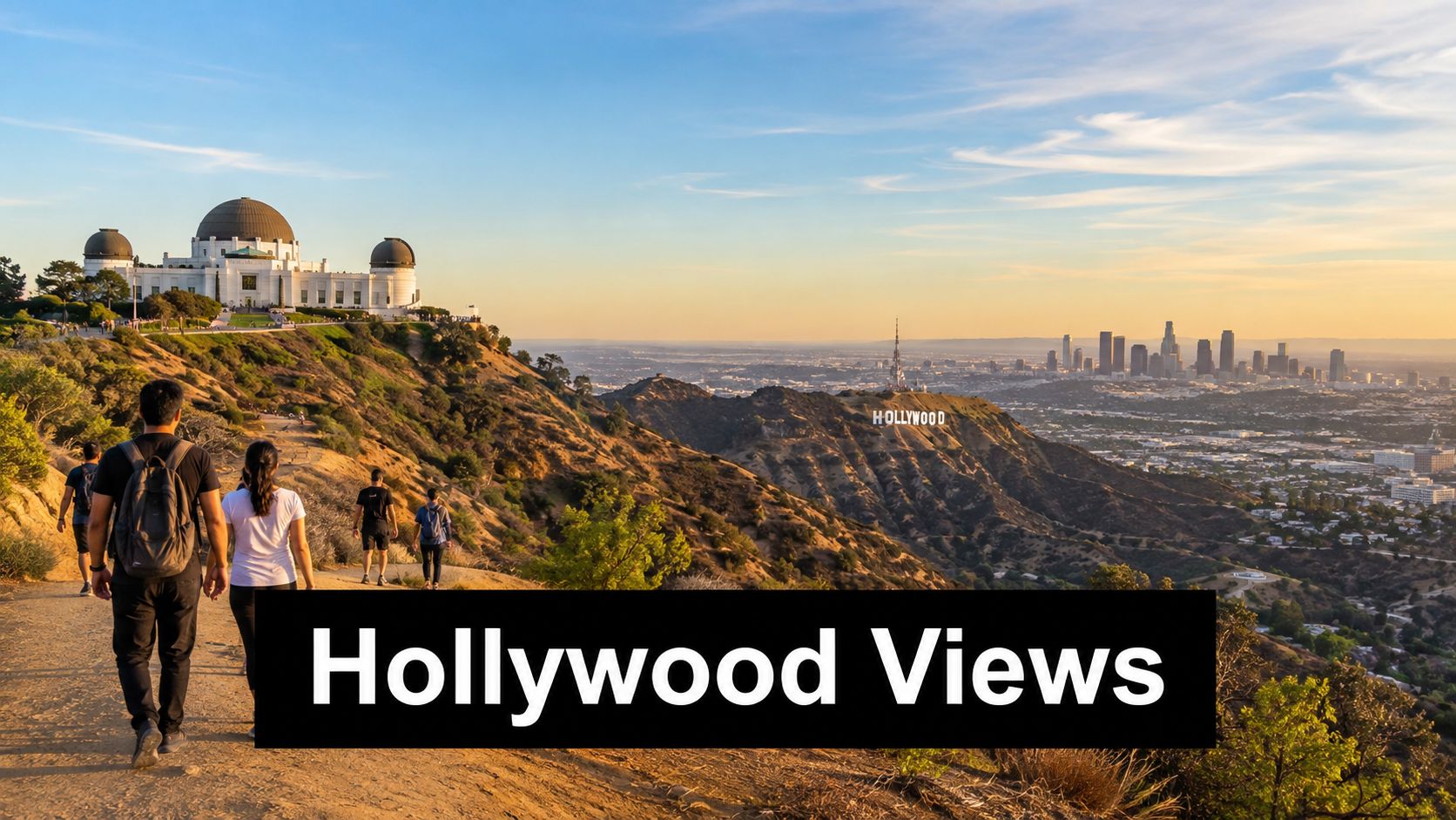 People hiking on a trail overlooking the Griffith Observatory and the Hollywood Sign in Los Angeles.