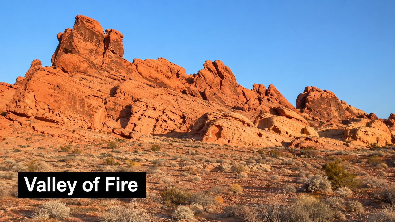 A stunning landscape of red sandstone rock formations at Valley of Fire State Park in Nevada.