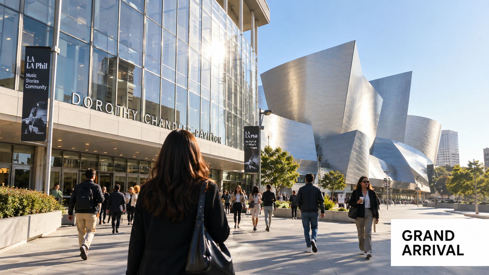 People walking on a plaza in front of the modern Dorothy Chandler Pavilion and Disney Concert Hall