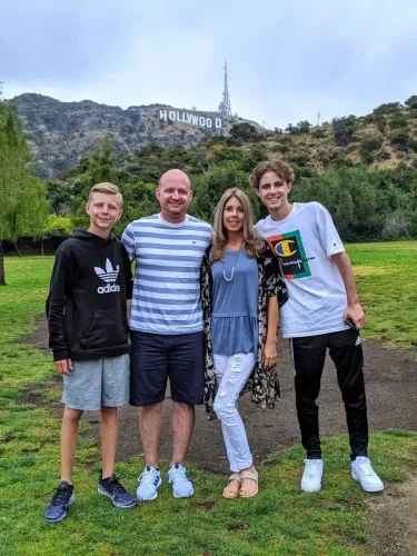 Family in front of Hollywood Sign